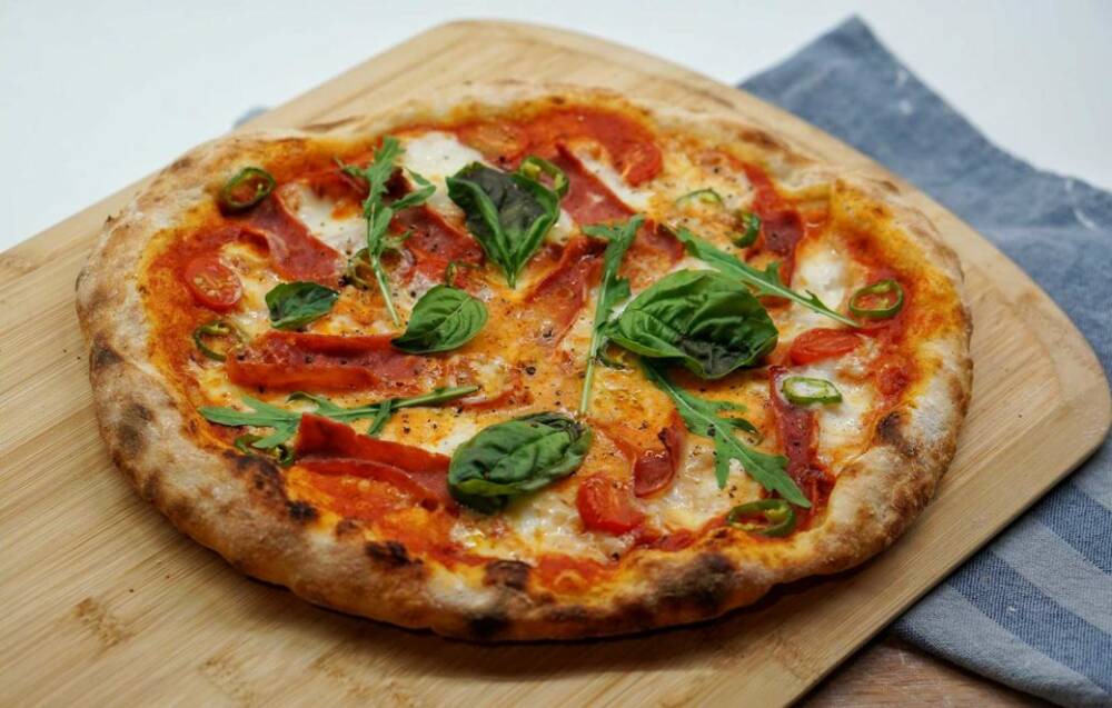 Fluffige Pizza gibt's auf dem Campus der Universität in der Kantine Schlüters / ©Unsplash/Amirali Mirhashemian